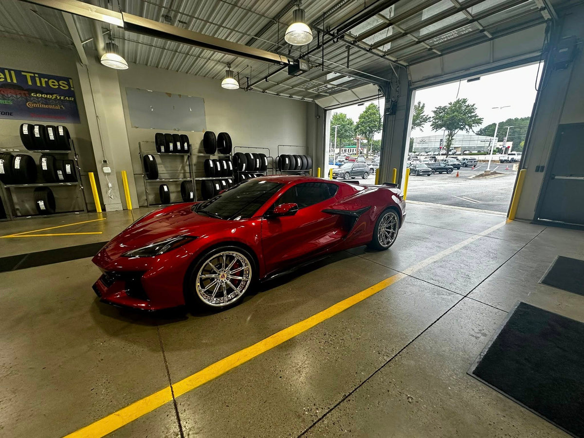 Rear angle of 2024 Corvette Z06 showing RVRN RV-DC29 dark red screws