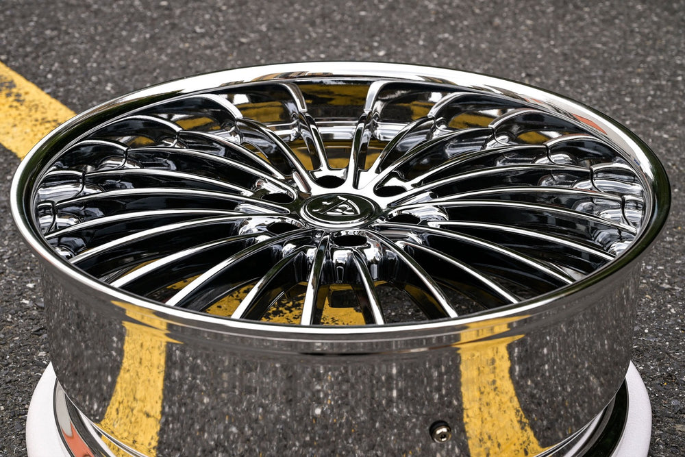 GMC Yukon custom forged black chrome wheel with a polished finish, showcasing intricate design and modern aesthetics.