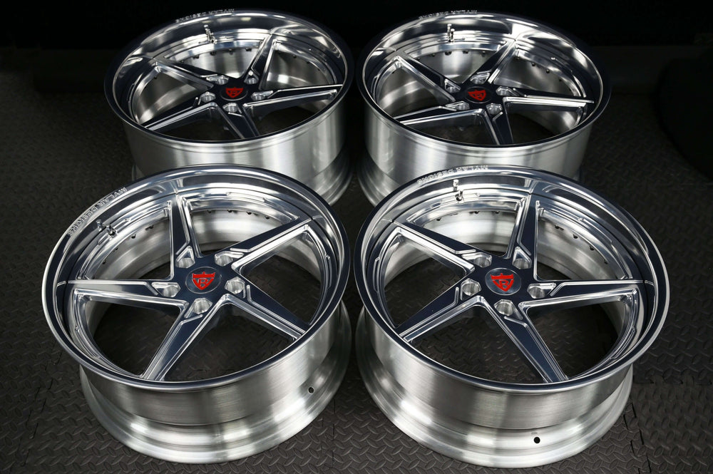 Set of four custom forged Porsche Cayman wheels featuring a 5-spoke deep lip design. Perfect for enhancing performance.