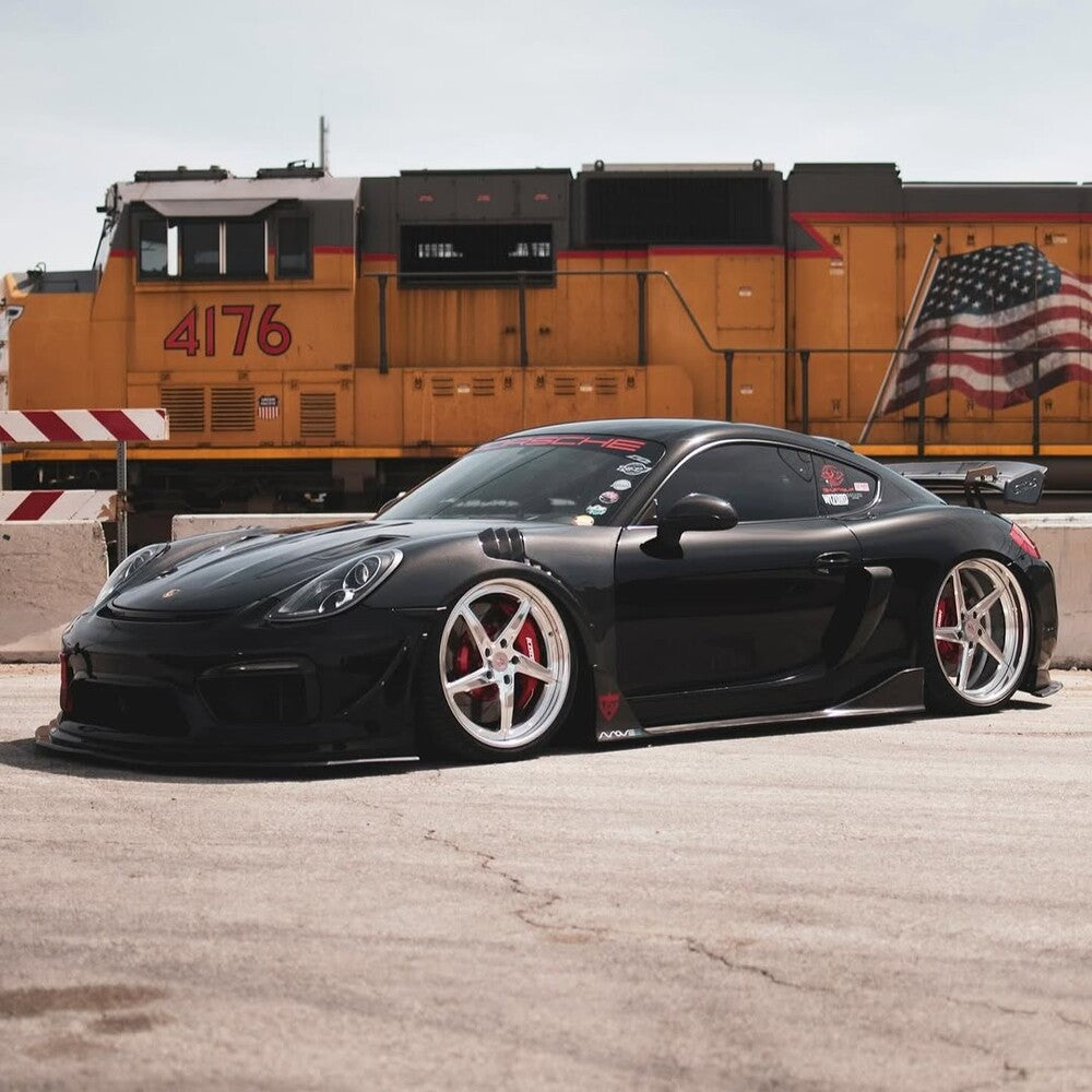 RVRN custom forged wheels RV-DP02 on a 2014 Porsche Cayman Widebody, 21inch staggered size, bespoke rims with 5 spoke and deep dish style 