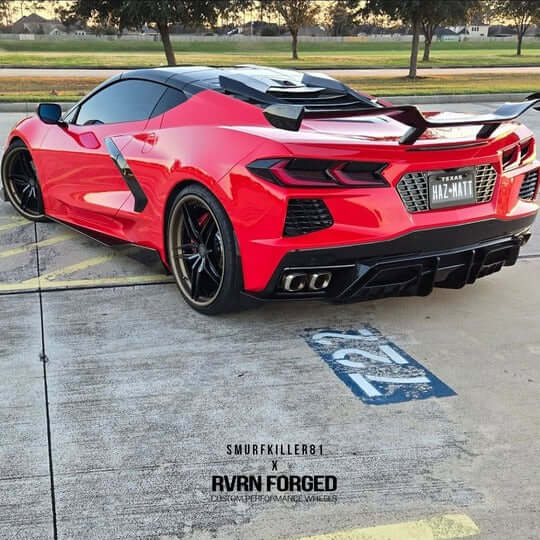 Red Corvette C8 with custom forged 5 spoke rims, showcasing sleek design and performance-enhancing wheels.
