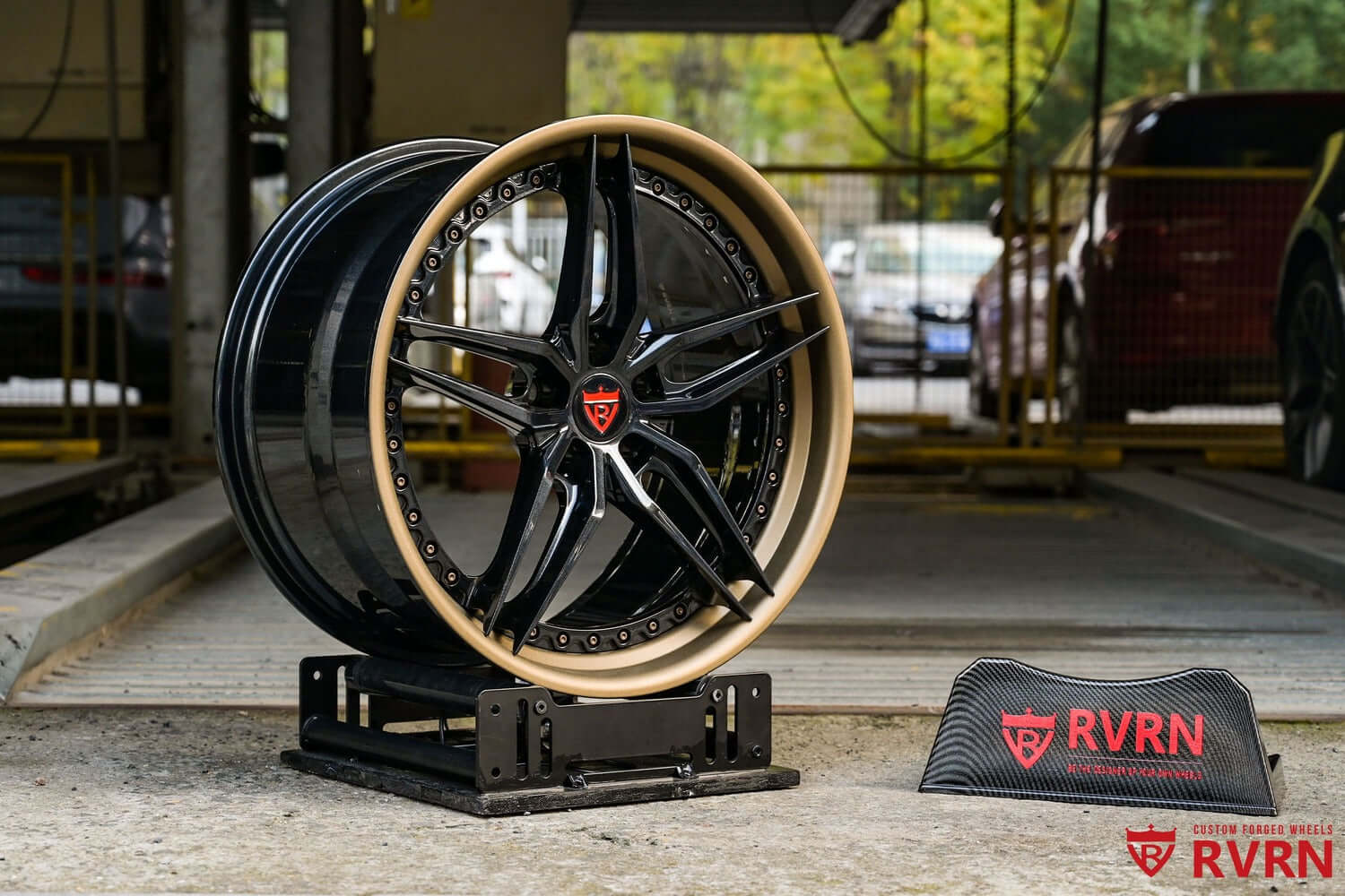 Custom forged Corvette C8 wheels with 5 spoke rims, showcasing elegance and performance in sleek black and gold design.