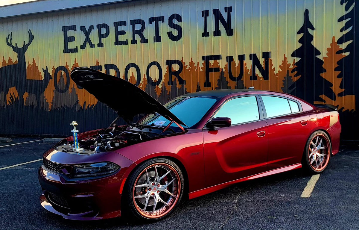 Dodge Charger Daytona rear view with RVRN RV-DR08 deep dish forged wheels 22x10 rose gold and red
