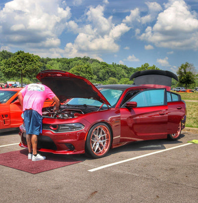 Close-up of RVRN RV-DR08 polished rose gold deep dish wheel on 2018 Dodge Charger Daytona front 22x9.5 fitment