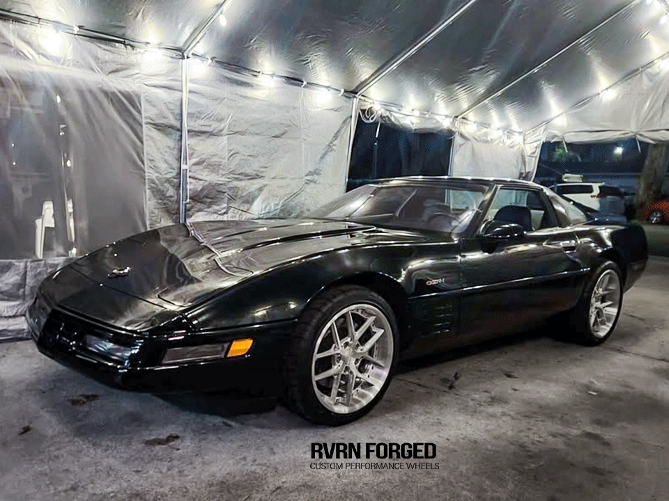 Close-up of RVRN RV-DR08D brushed aluminum spokes and chrome screws on 1994 Corvette C4 ZR1 forged wheels.