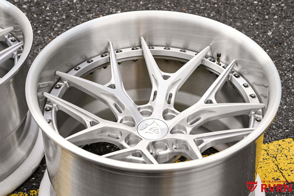 Close three-quarter view of the brushed aluminum RVRN RV-DR08D forged wheel face, 2004 Dodge Viper custom set