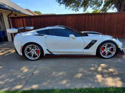Close-up of chrome forged RVRN wheels on Corvette C7 Z06 brake setup