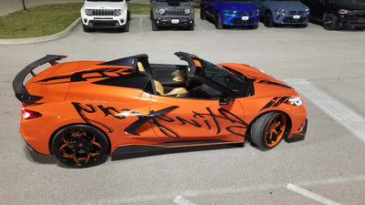 2021 Corvette C8 Z51 with RVRN RV-DS016 forged wheels – orange spokes and gloss black barrels, side profile view.