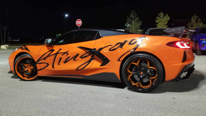 Close-up of RVRN RV-DS016 20x9 front forged wheel on 2021 Corvette C8 Z51 – orange spoke detail.