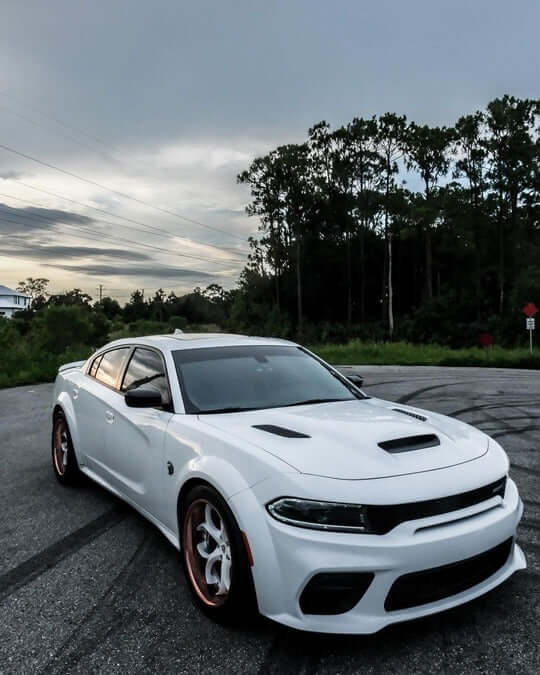 White 2023 Dodge Charger Hellcat Scat Widebody with custom rose gold forged deep dish and white wheels 