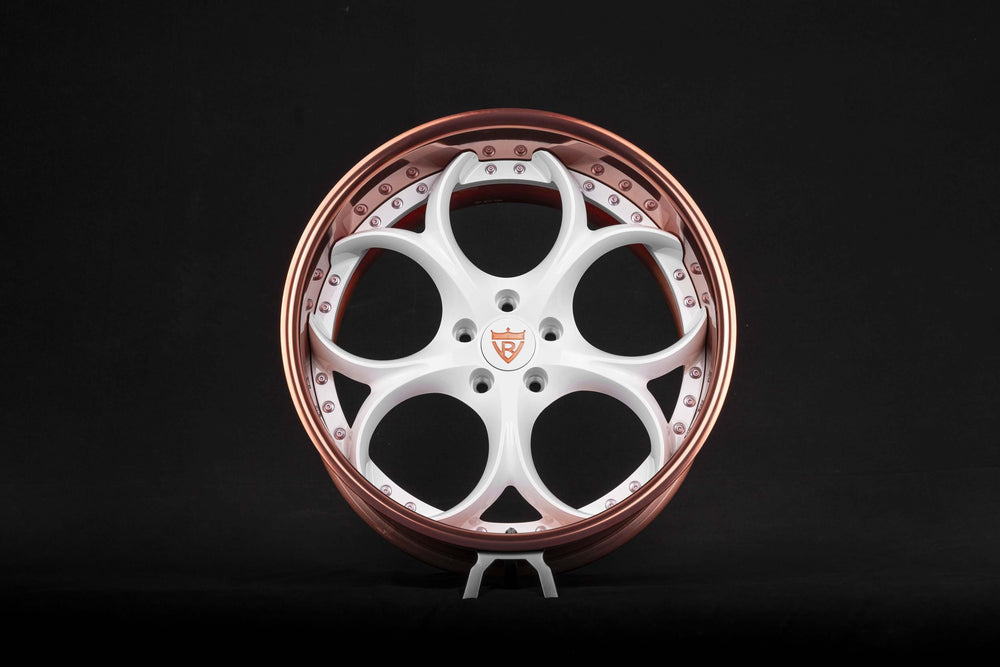 Custom rose gold Charger Hellcat wheel forged for luxury vehicles.