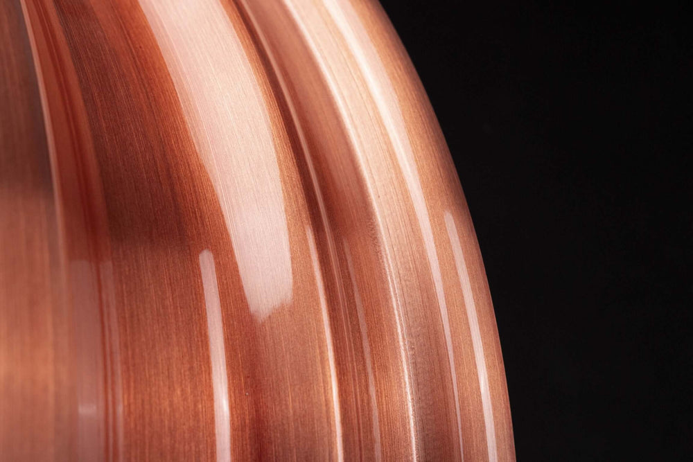 Close-up of custom forged rose gold Charger Hellcat wheel design with sleek finish.