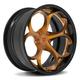 Custom 2-piece forged wheels with a black finish and gold accents designed for any vehicle, featuring unique styling and precision engineering.