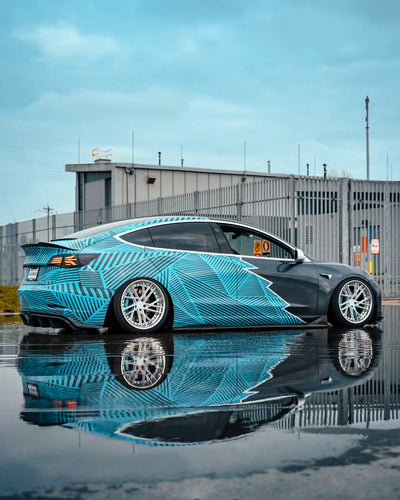 2018 Tesla Model 3 Long Range AWD with RVRN RV-DT01 forged wheels front 3/4 view polished aluminum blue 19x10 19x11