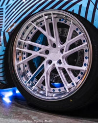 Rear angle Tesla Model 3 on RVRN RV-DT01 wheels deep polished aluminum blue 19x11 fitment