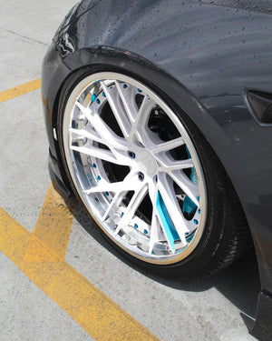 Rear angle Tesla Model 3 on RVRN RV-DT01 wheels deep polished aluminum blue 19x11 fitment