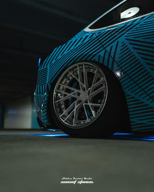 Rolling shot Tesla Model 3 on RVRN polished aluminum blue forged wheels RV-DT01