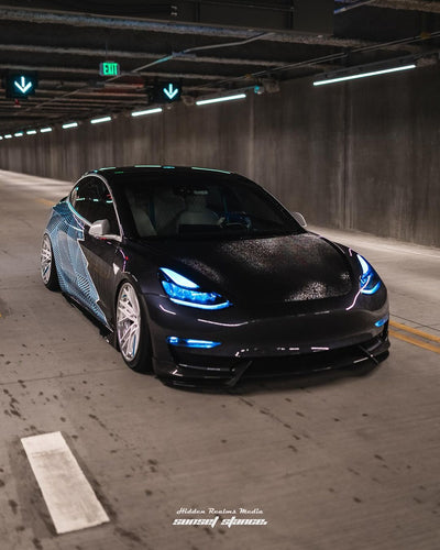 Rear angle Tesla Model 3 on RVRN RV-DT01 wheels deep polished aluminum blue 19x11 fitment