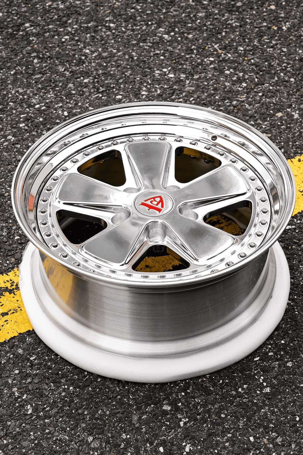 Classic 5 spoke deep custom forged 2-piece VW wheels on asphalt, perfect for enhancing Volkswagen performance and style.