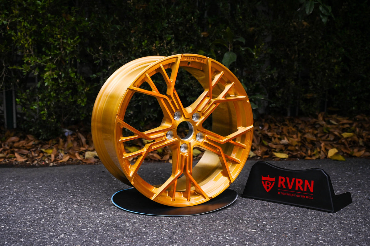 Custom forged wheel for 2014 C7 Corvette, featuring a vibrant gold finish and unique design for enhanced style.