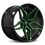 Custom forged monoblock wheel with a glossy black finish and green accents, perfect for sporty cars like Camaro.