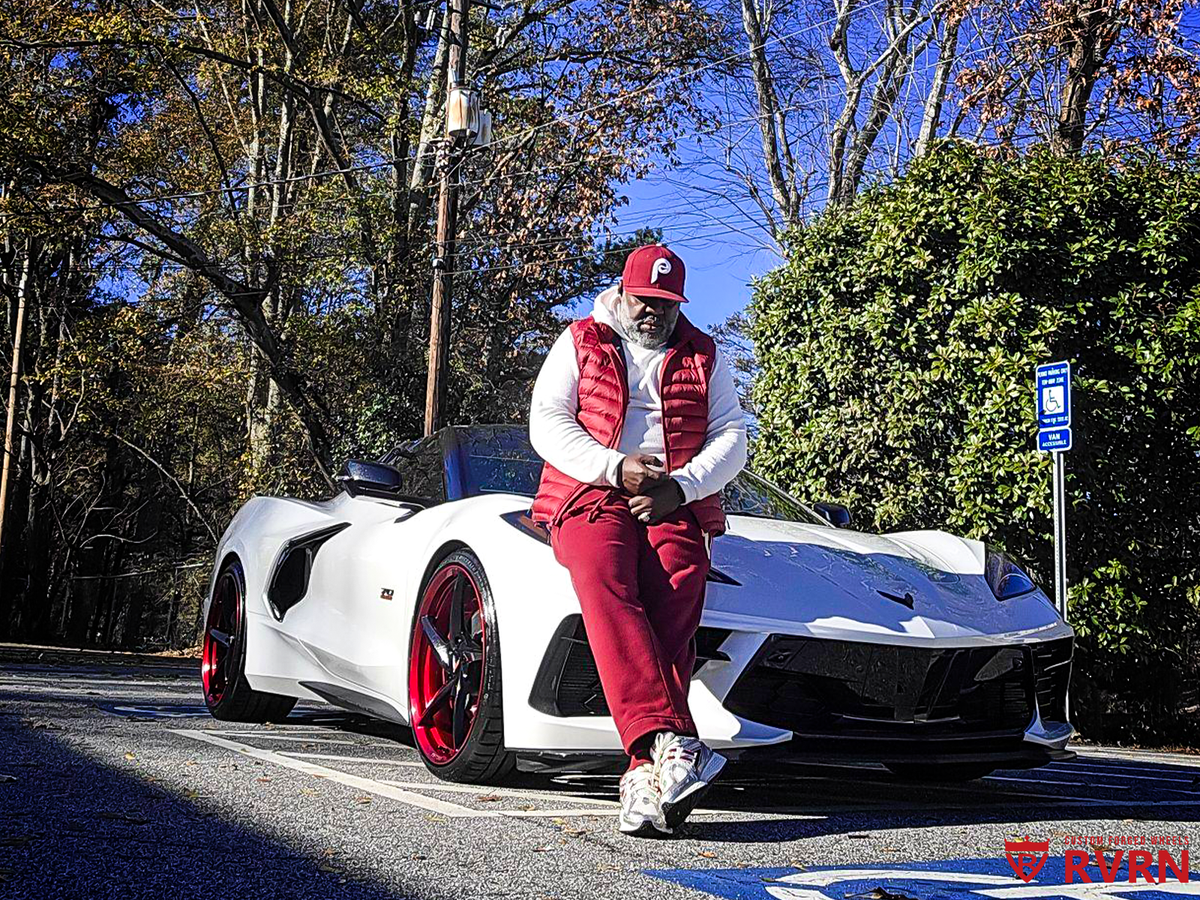 Close-up of MC35 20x9 front wheel on 2023 Corvette C8 Z51, gloss black with red mist accents