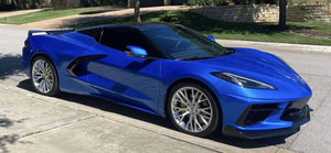 Rear three-quarter view of a Riptide Blue 2024 Corvette C8 Stingray with rear wing on RVRN RV-MC65 brushed aluminum forged wheels