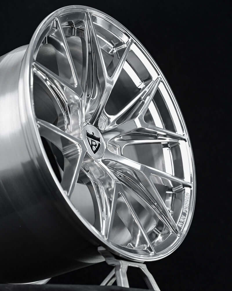 Close face-on view of the polished aluminum concave RVRN RV-MH051 forged wheel and center cap, 1990 Dodge Viper RT/10