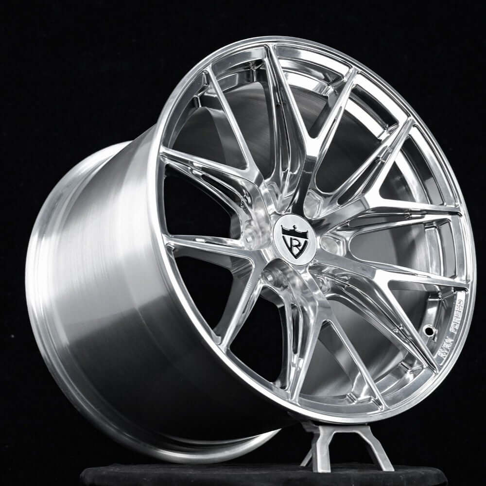Polished aluminum mesh RVRN RV-MH051 forged wheel standing on a dark studio floor, custom wheels for the 1990 Dodge Viper RT/10