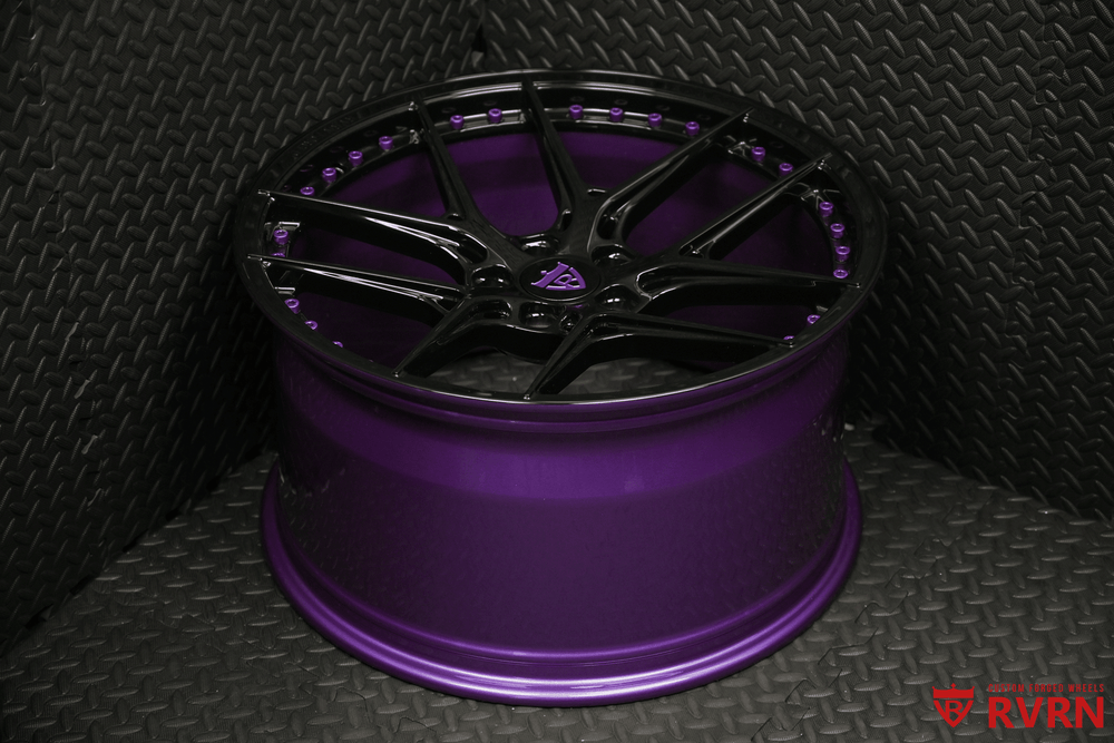 Custom black and purple wheel designed for a 2019 Ford Mustang, showcasing unique styling for personal vehicle customization.