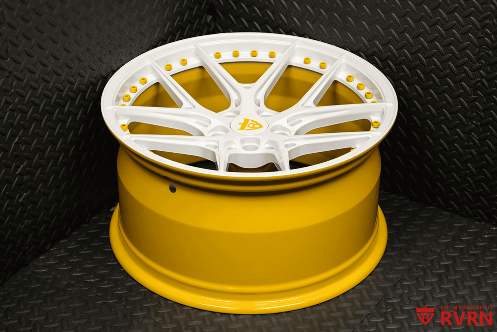 Custom yellow and white wheel design suitable for a 2019 Ford Mustang. Elevate your ride with unique wheels.