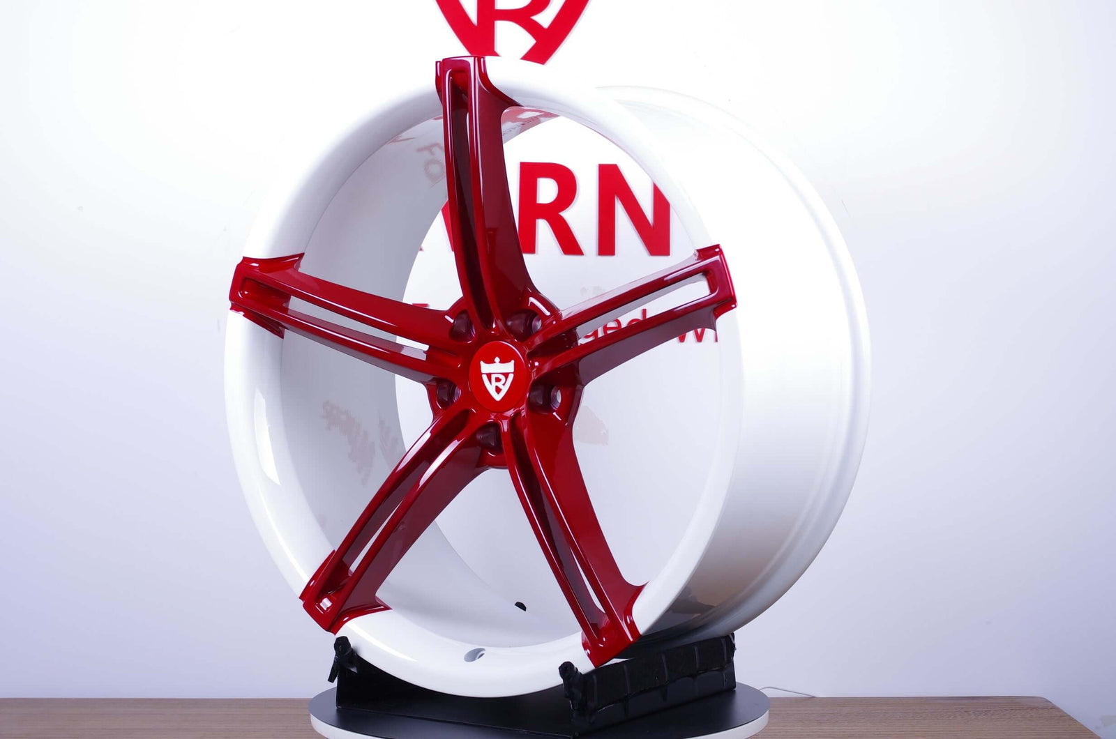 Custom forged maroon rims for Camaro with 5 spoke design, showcasing a stylish blend of performance and aesthetics.