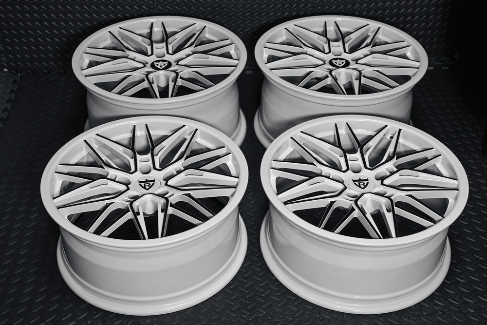 Four Ivory White mesh RVRN RV-MS808 forged wheels arranged on a dark background, 2016 Corvette C7 Stingray custom set
