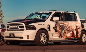 Side profile of 2018 Dodge Ram with custom 20x9 deep dish forged wheels, truck stance, tailored design