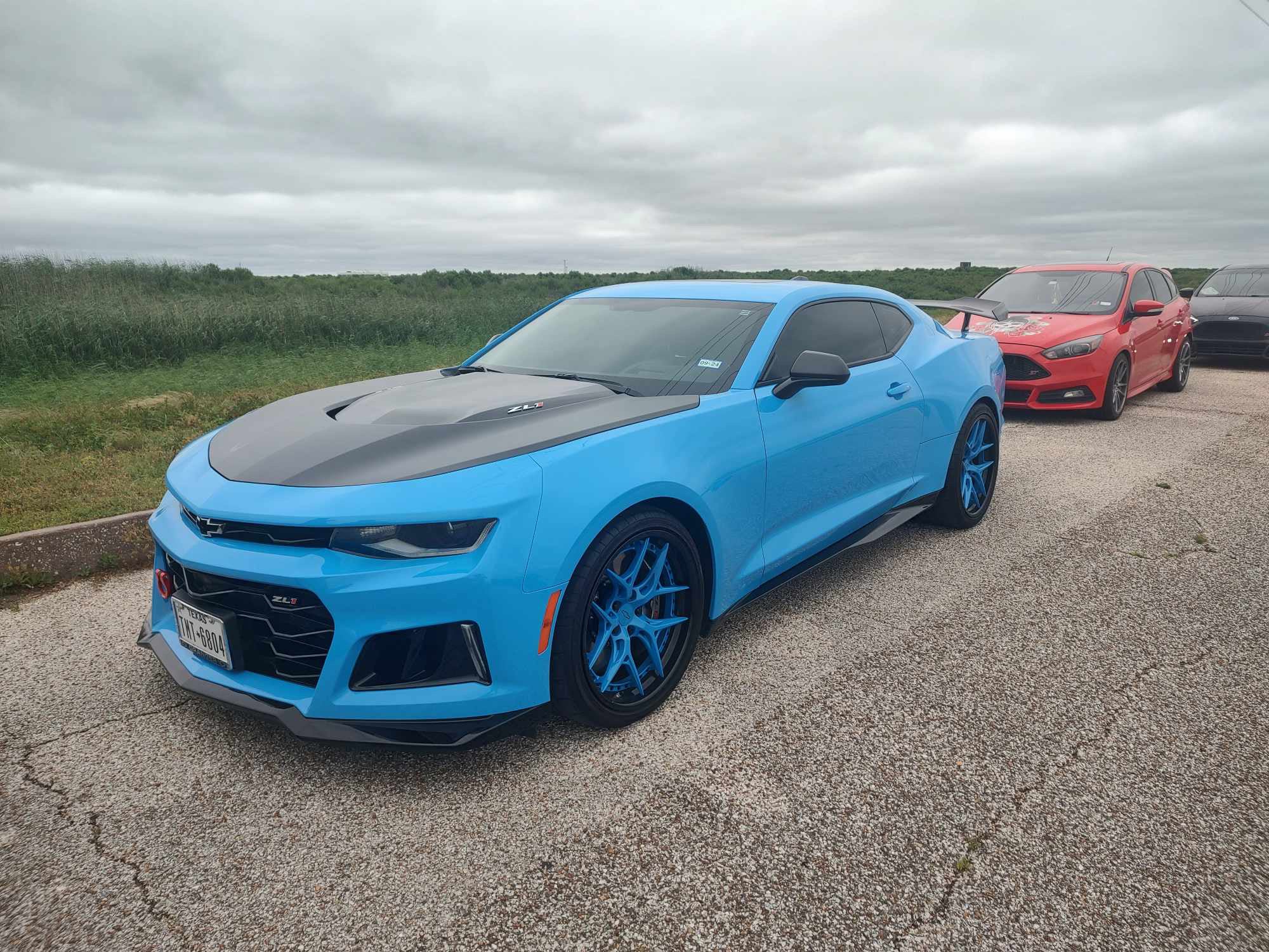2022 Camaro ZL1 with custom 20x10 front and 20x11 rear 2-piece forged wheels, aggressive fitment