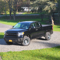 Side profile showing 18x9 forged concave wheels on Toyota Tundra, custom wheel fitment and style