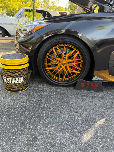 2020 Kia Stinger GT1 with RVRN custom forged deep dish wheels, showcasing a striking design and vibrant yellow accents.