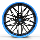 Custom forged black and blue concave Corvette wheel design, engineered for performance and aesthetics.