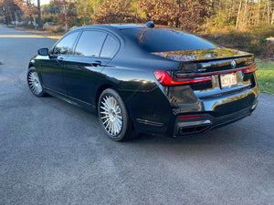 Rear fitment of RV-TR66 forged wheels 20x10 on 2020 BMW M670, brushed silver spoke with matte black barrel.