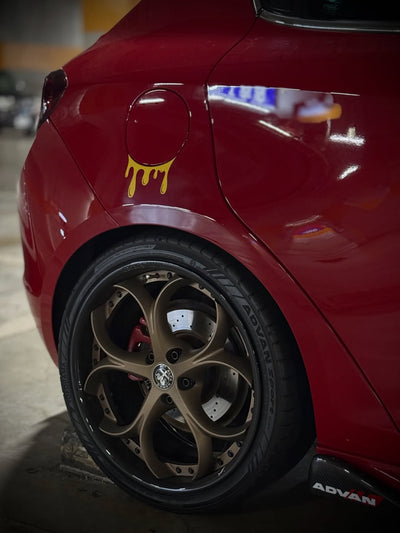2013 Alfa Romeo with RVRN custom forged wheels, featuring bronze and black rims.