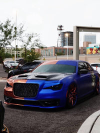 2014 Chrysler 300S with custom forged rims and 22-inch wheels, showcasing a sleek blue and black design.