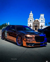 2014 Chrysler 300S featuring custom 22-inch forged wheels, showcasing a striking design and powerful presence.