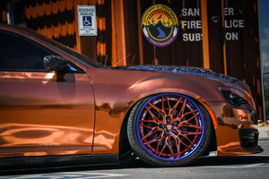 2014 Chrysler 300S with custom 22-inch forged wheels showcasing a unique bronze and blue color scheme.