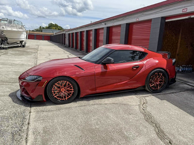 2021 Toyota Supra A90 driving shot with RVRN C081 forged wheels 19x9.5 front & 20x11 rear.