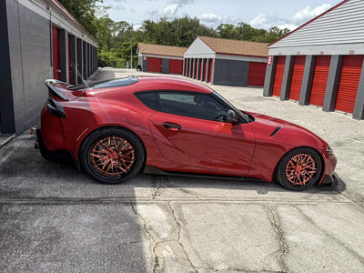 Side profile of 2021 Toyota Supra A90 showcasing RVRN C081 19x9.5/20x11 custom forged wheels.