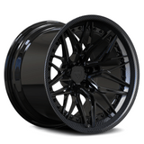 Custom forged concave carbon fiber wheel design, showcasing a sleek black finish and intricate detailing for style and performance.