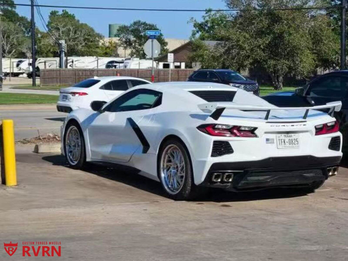 2021 Corvette C8 Z51 with custom forged wheels parked, showcasing aftermarket rims and sporty design.