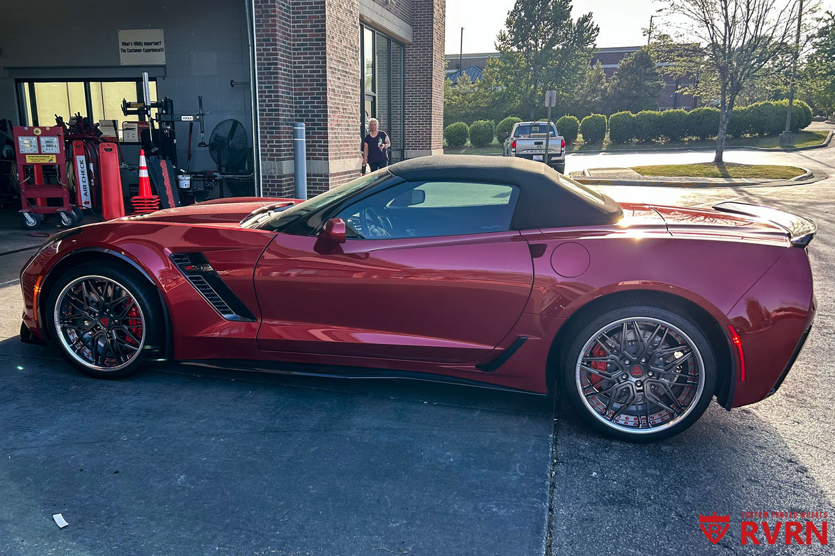 Roderick Harrisons 2015 Corvette C7 Z06 in Long Beach Red with RV-T081 custom forged wheels parked at automotive service center