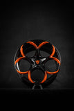 Black and orange custom forged Corvette C8 wheels by RVRN Wheels (RV-MS016) on a dark background.