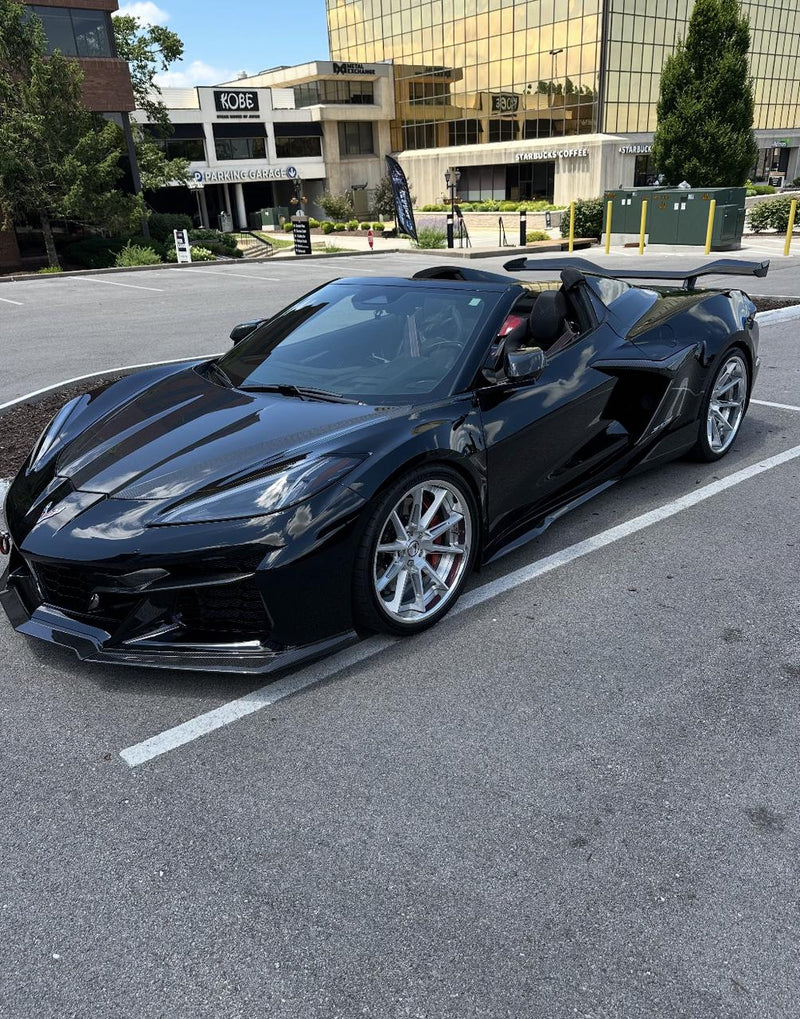 Side profile of a custom Corvette Z06 on RVRN forged wheels.